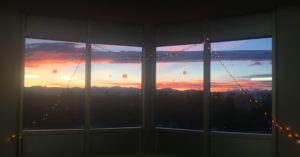 Sunset over Rocky Mountains from Centennial Halls
