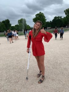 This photo shows me in Paris the day I was allowed to switch to one crutch instead of two. 
