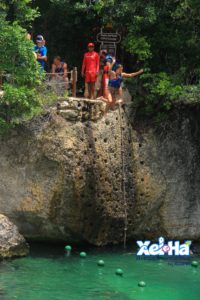 In this picture we are cliff jumping. Each of the spots that had cliff jumping had these fun rocks to jump off of. 